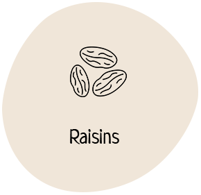 A picture of raisins on the side of a table.